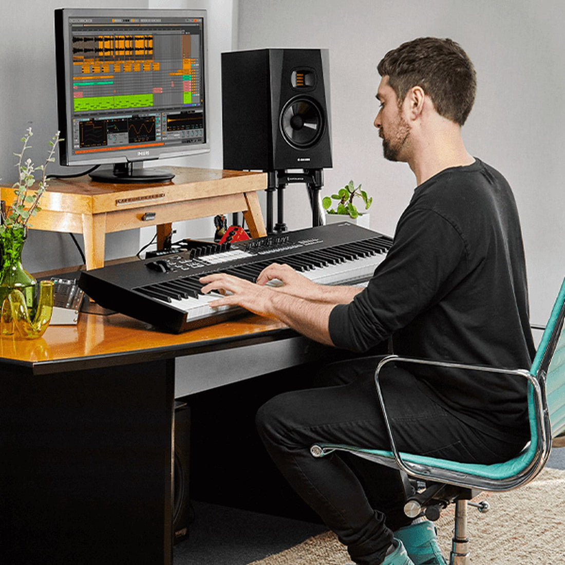 Novation Launchkey 88 MK4 on a producer desk in a studio, completing the MK4 range