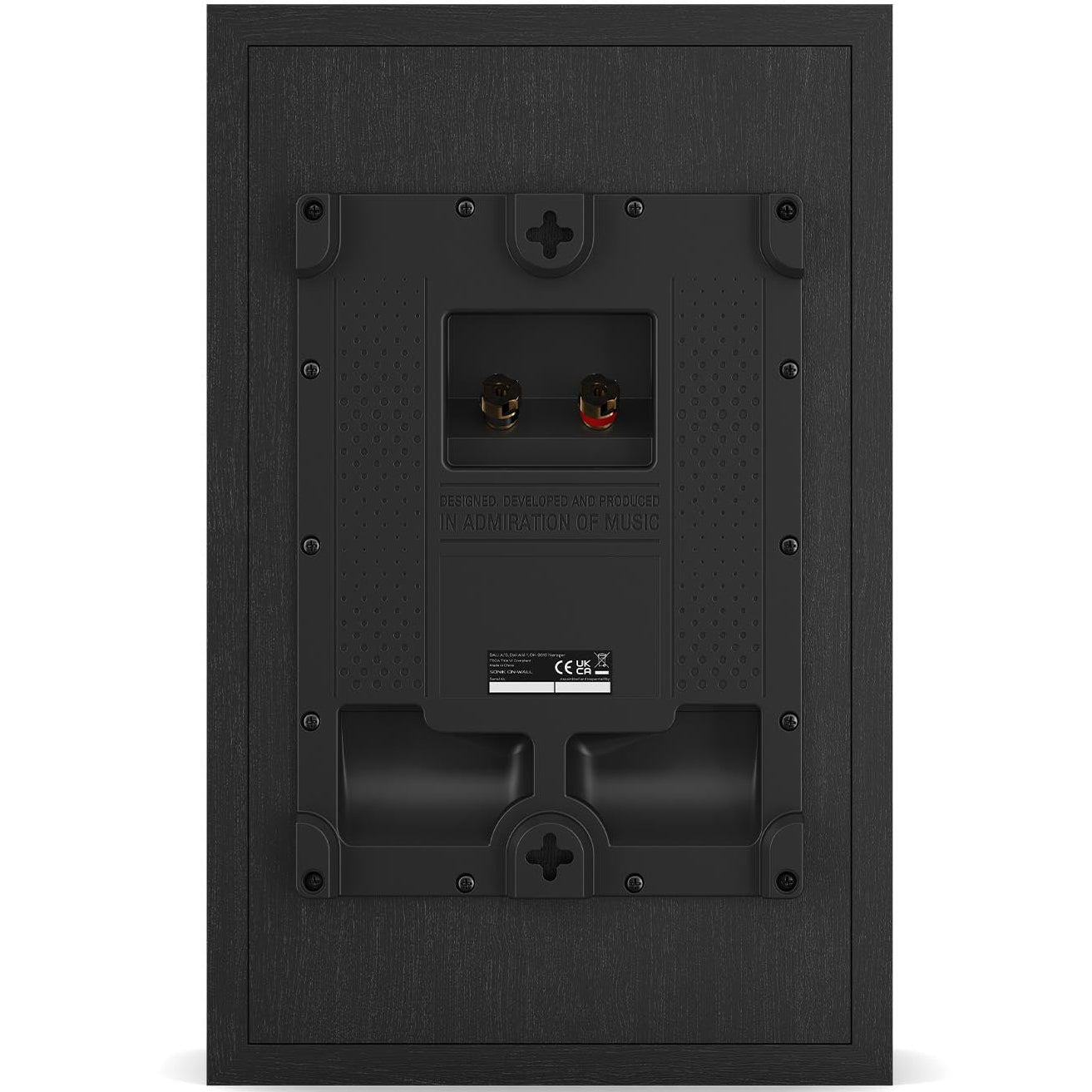 DALI Sonik On-Wall in-wall outdoor speakers with sleek black design, mounted on a wall for premium sound experience.