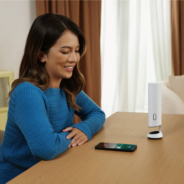 Insta360 Wave video conferencing camera with sleek design, mounted on a desk setup, ready for high-quality video calls.