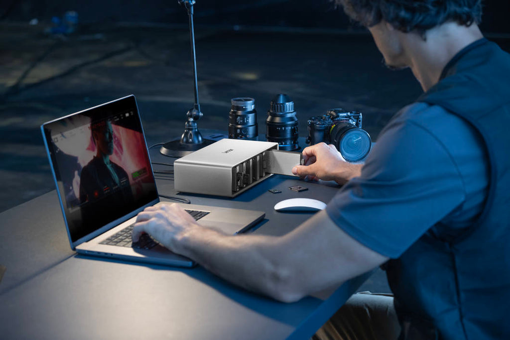 Lexar Workflow Go docking station with Thunderbolt 4 uplink and six-module bay, designed for professional data transfer and connectivity.