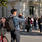 Think Tank Walker Pro Series backpack with multiple compartments for video equipment and accessories, black and durable design.