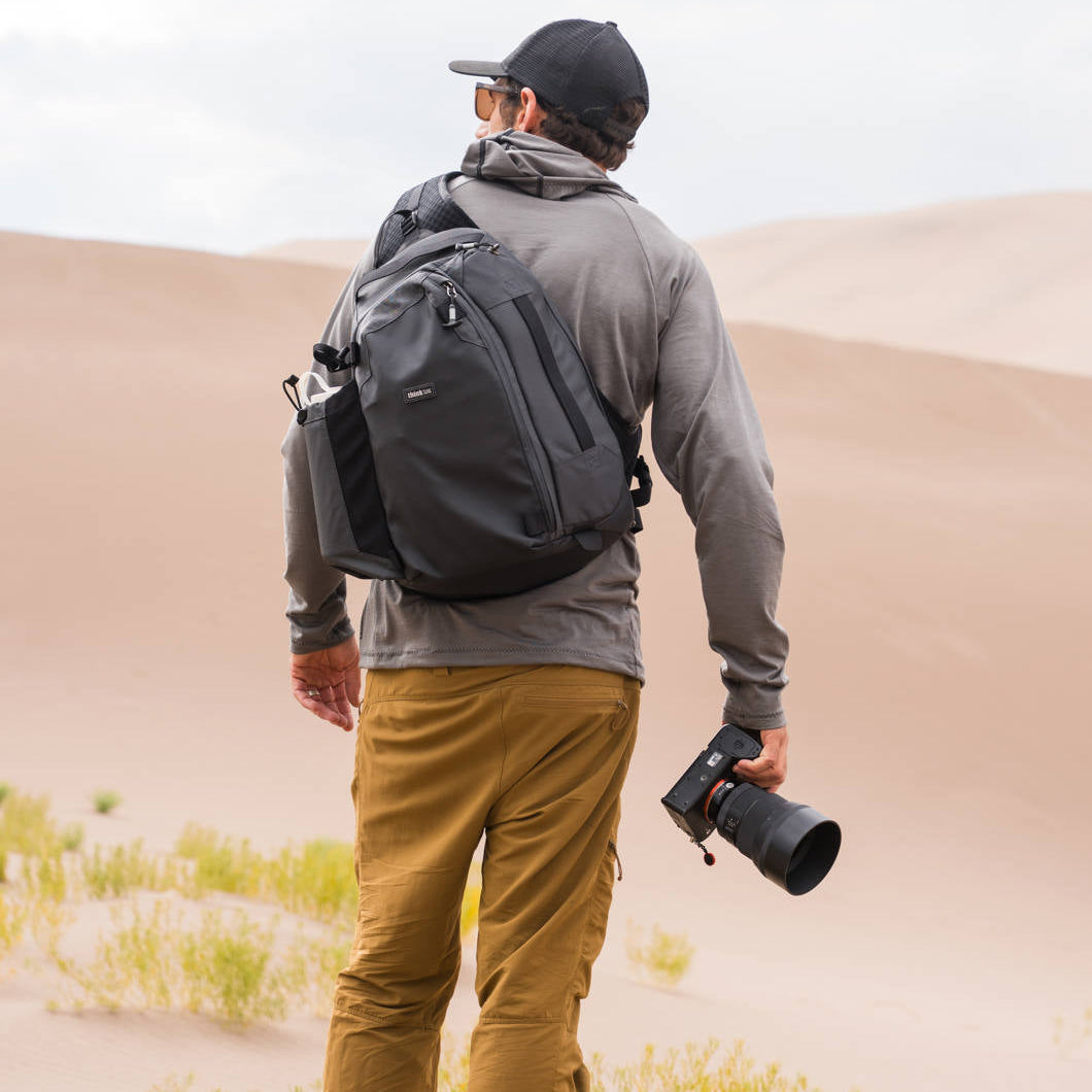 Think Tank MindShift PhotoCross Sling V2 camera bag with multiple compartments and padded straps for comfortable photo gear transport.