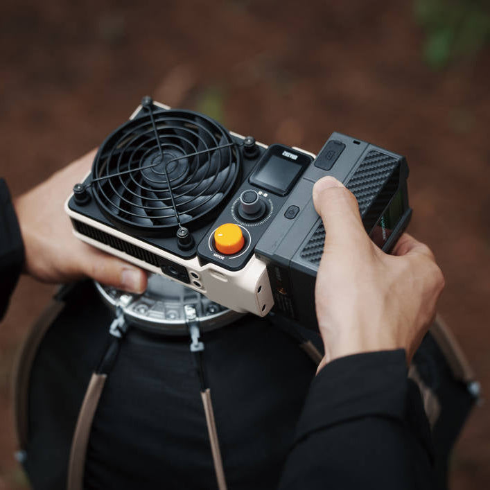 Zhiyun Molus LED X200 Bi-Color COB light with adjustable brightness and color temperature, ideal for professional video and photography.