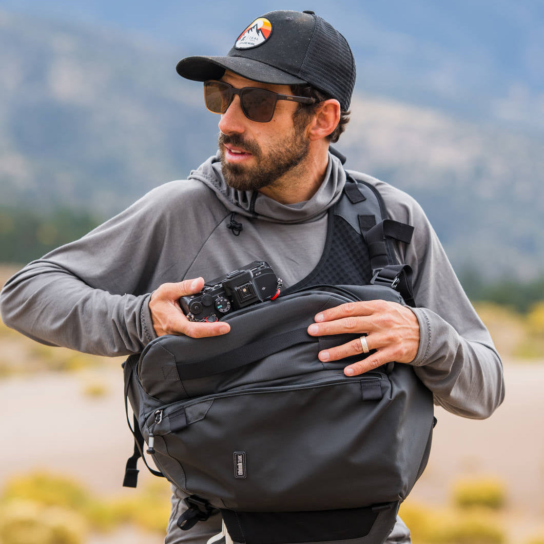 Think Tank MindShift PhotoCross Sling V2 video equipment bag with multiple compartments and padded straps for comfortable carrying.