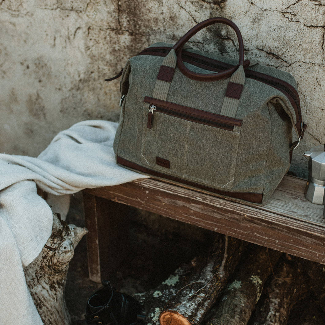 Think Tank Retrospective Weekender video equipment bag with padded compartments and sturdy handle for easy transport.