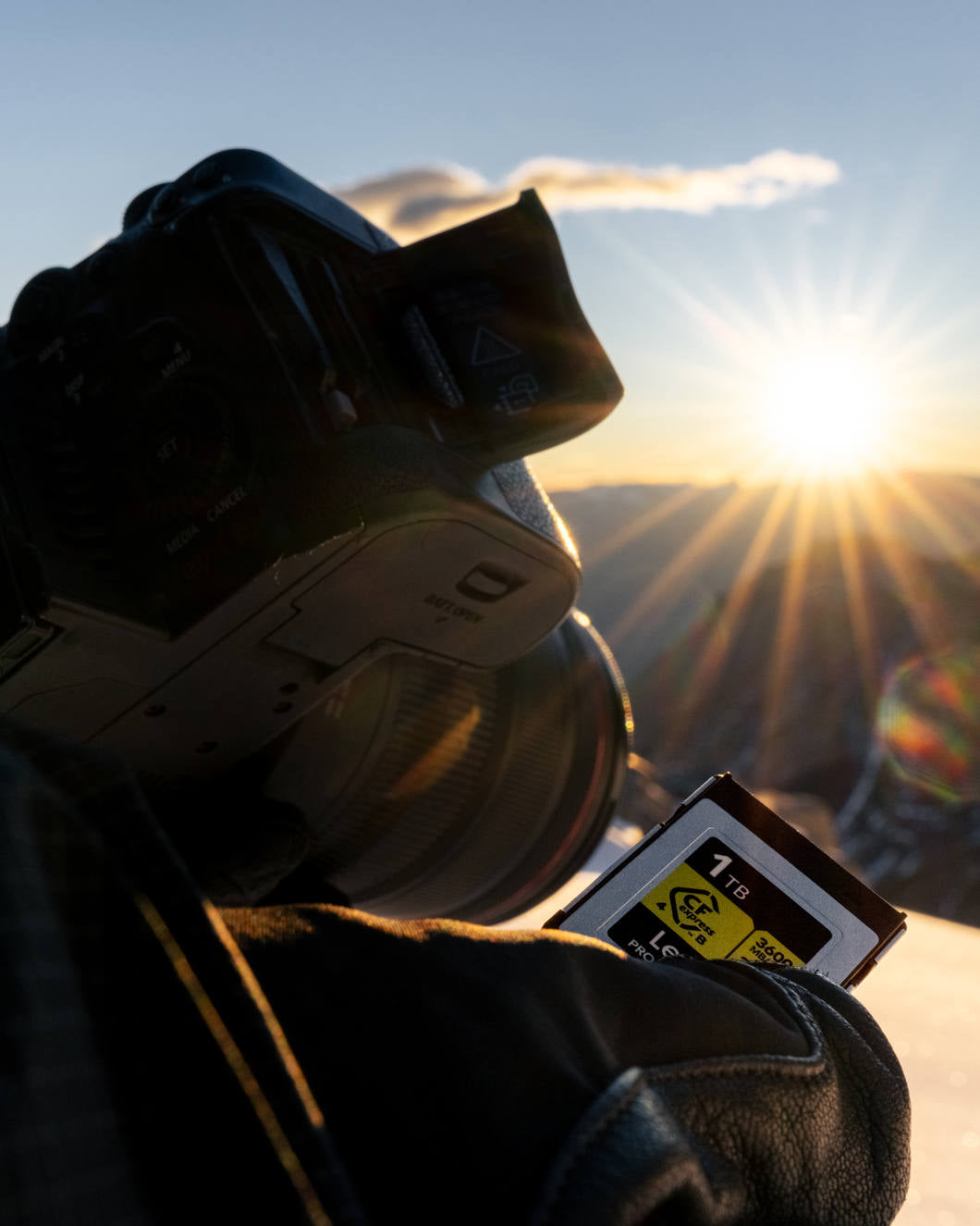 Lexar CFexpress 4.0 Pro Gold memory card with high-speed read and write capabilities, shown on a photography setup.