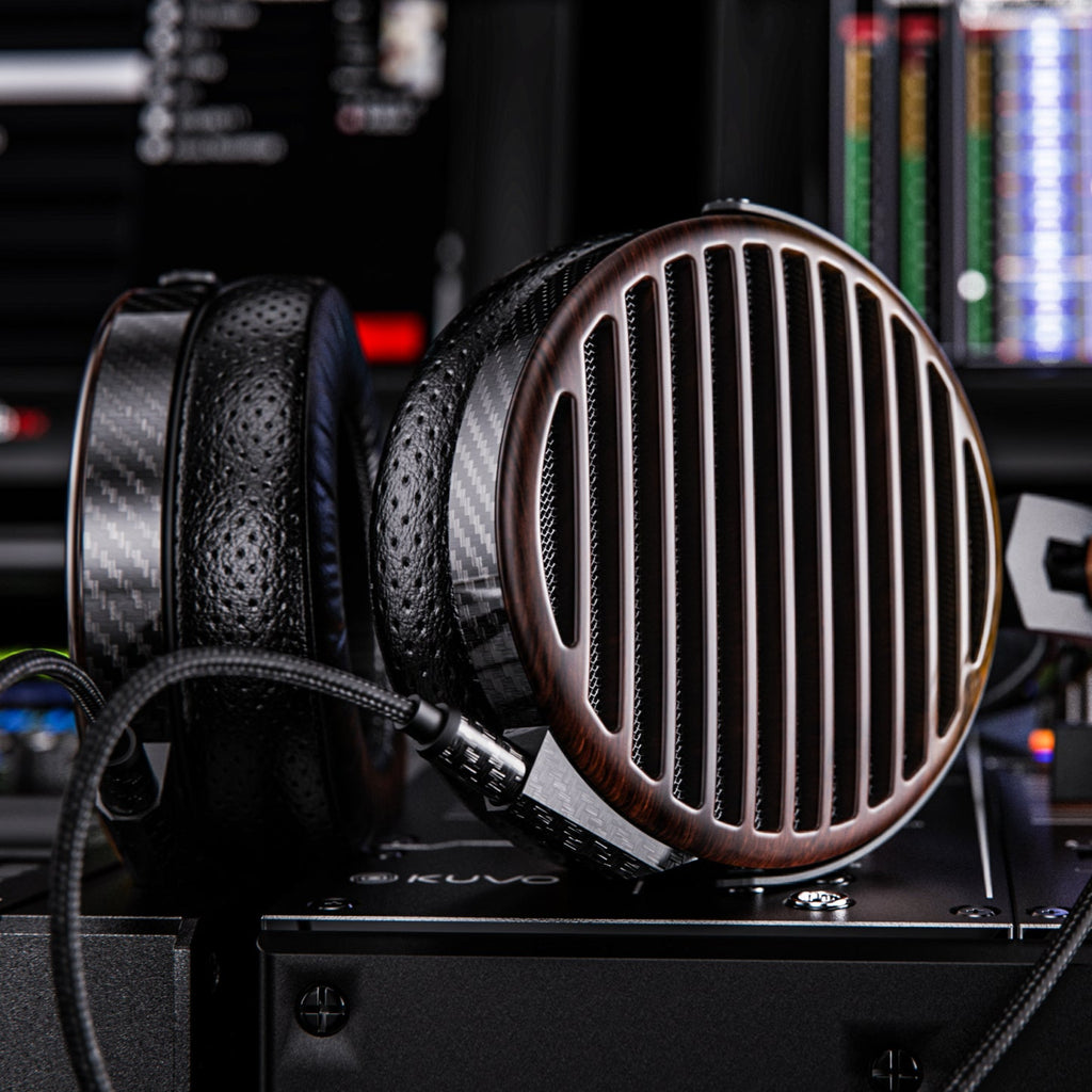 FiiO FT7 wired headphones with black ear cups and silver accents, featuring over-ear design and braided cable for high-quality sound.
