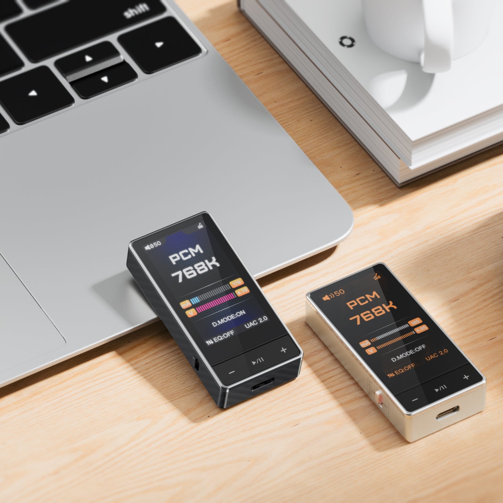 FiiO QX13 headphone amplifier and DAC with sleek black design and control knobs for high-quality audio enhancement.