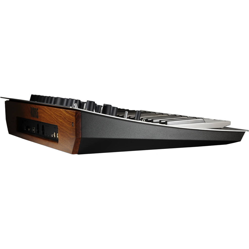 Korg Minilogue synthesizer with four-voice polyphony, touchscreen interface, and analog sound engine, shown on a music studio desk.