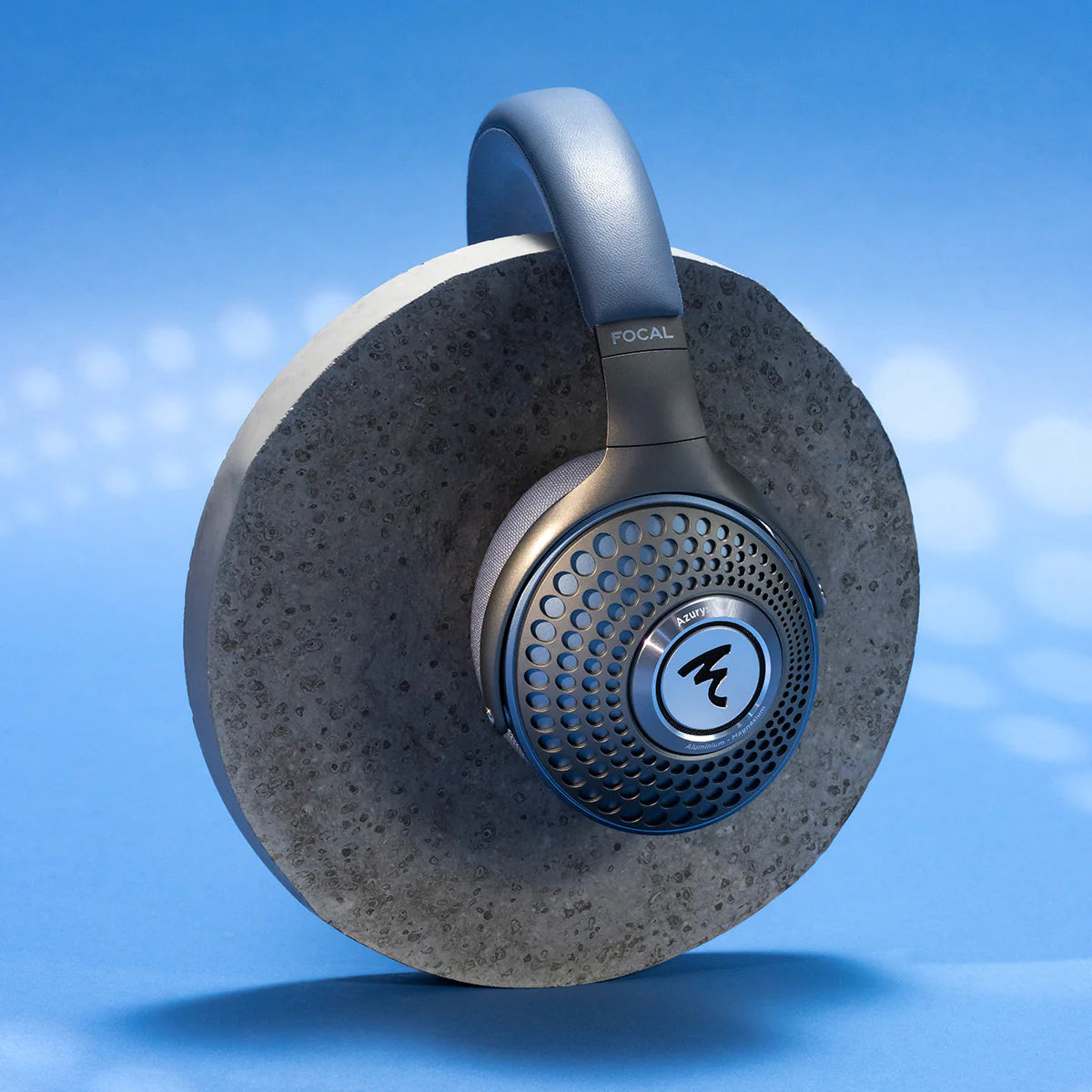Focal Azurys wired headphones with blue ear cups, featuring sleek design and padded headband for comfortable listening.