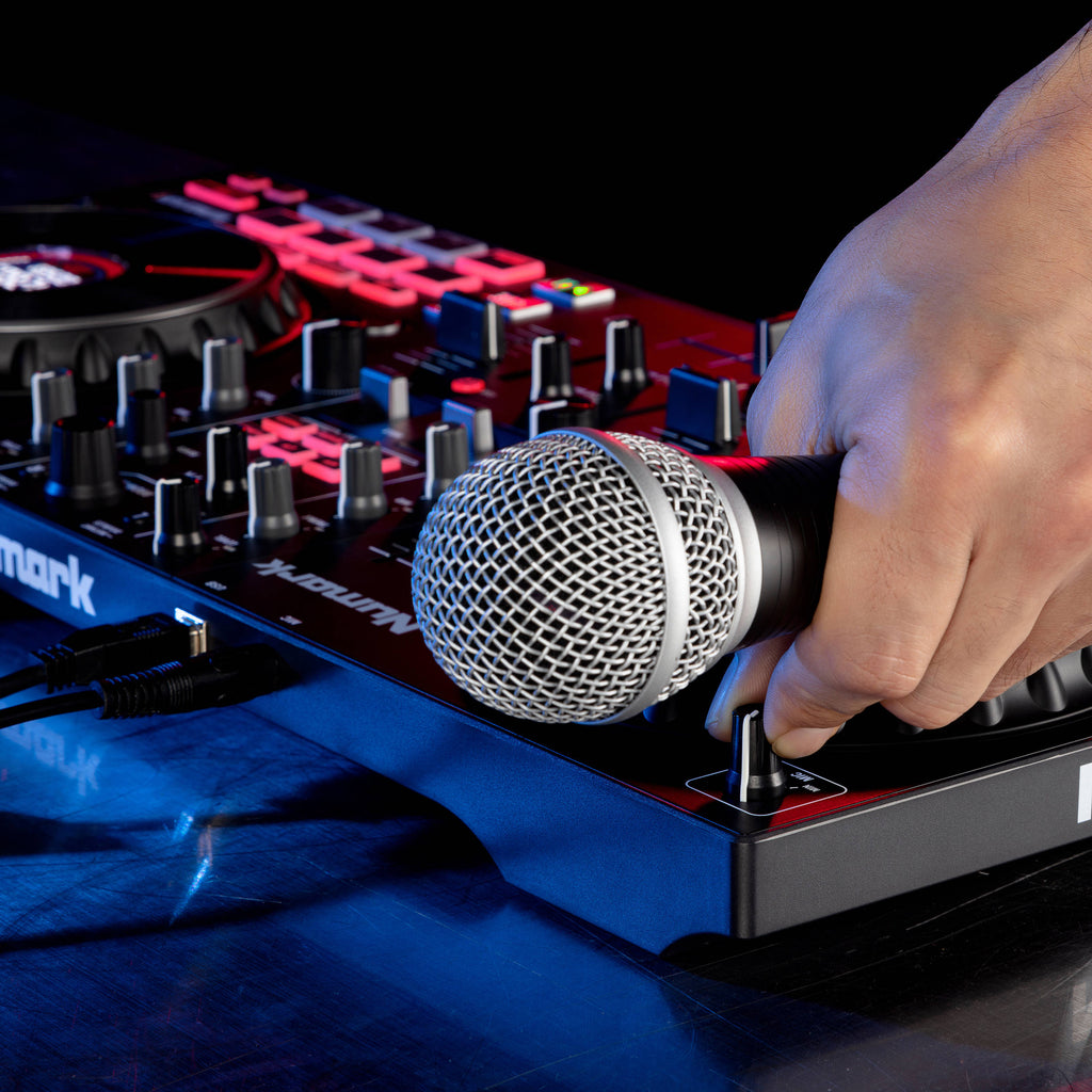 Numark Mixtrack Platinum FX DJ controller with jog wheels, faders, and controls for digital DJing on a sleek black design.