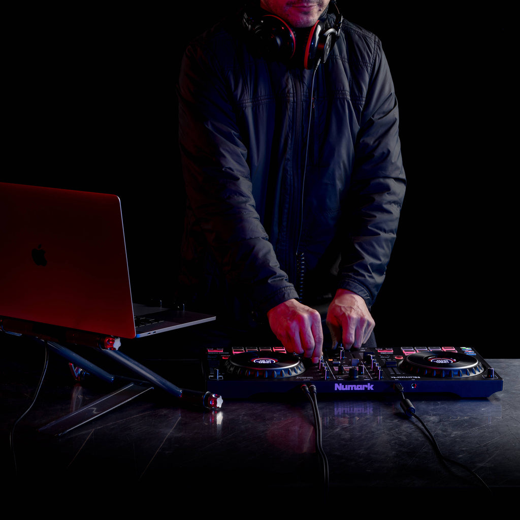 Numark Mixtrack Platinum FX DJ controller with jog wheels, control knobs, and built-in features for mixing and performance.