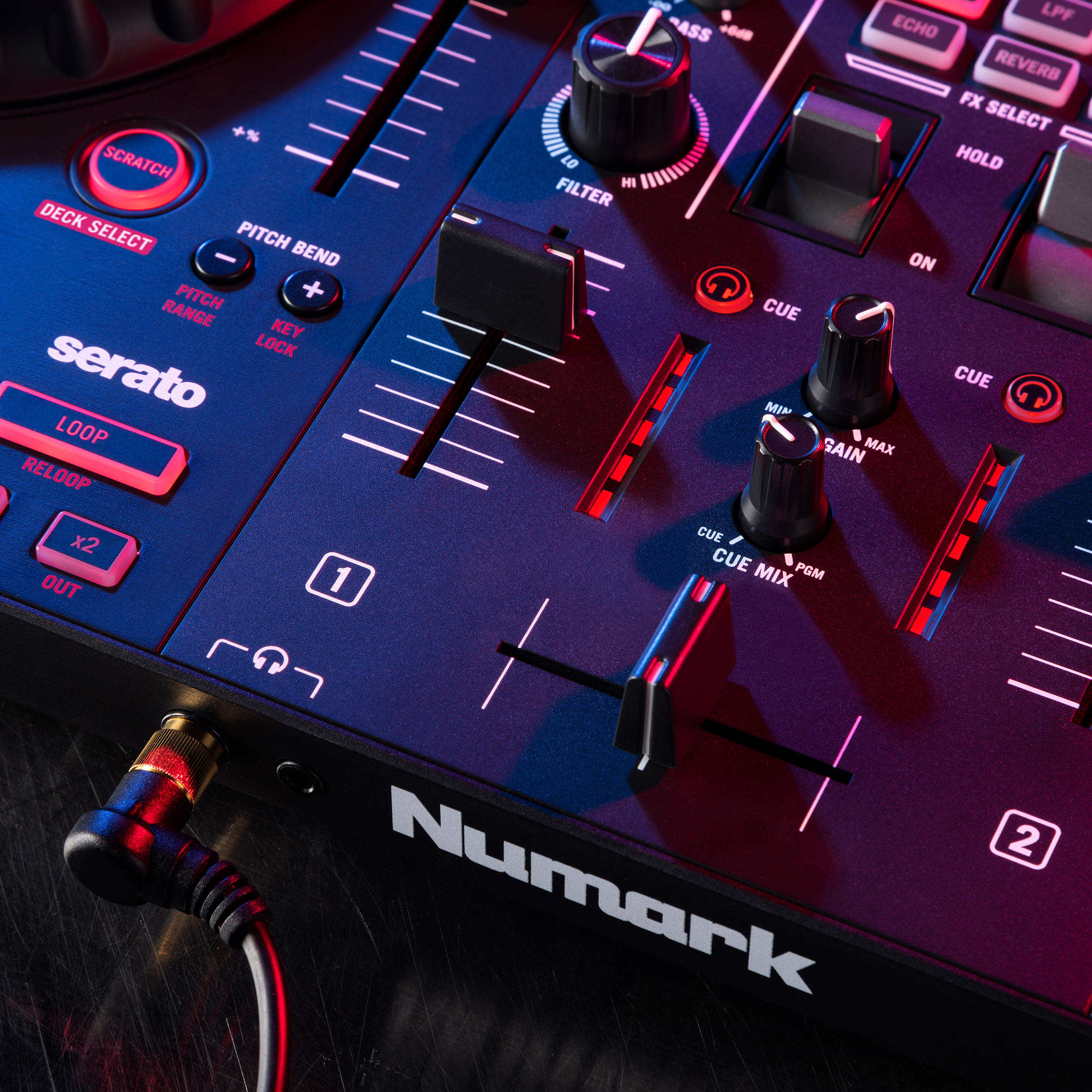 Numark Mixtrack Platinum FX DJ controller with jog wheels, faders, and controls for digital DJ mixing.