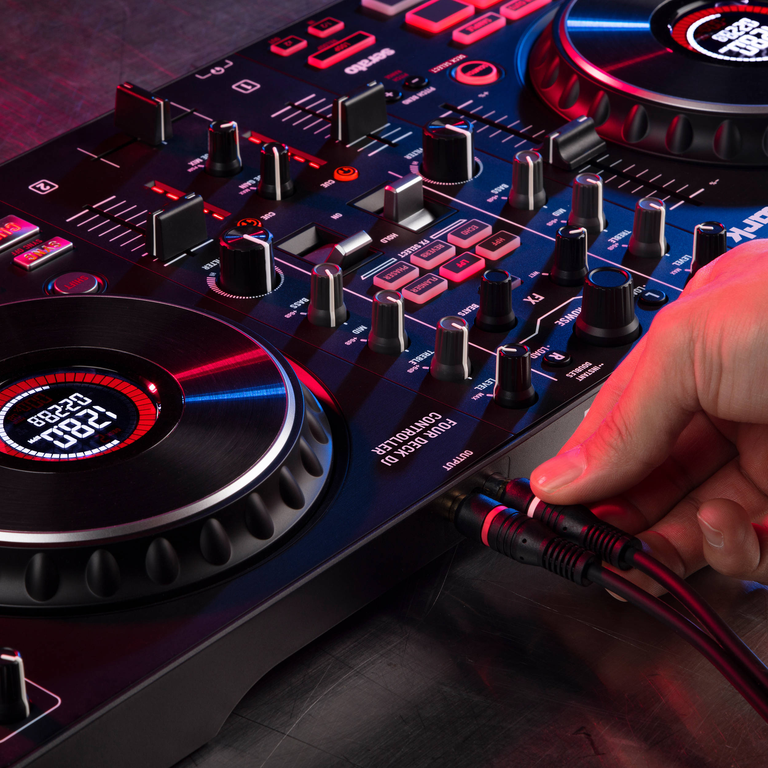 Numark Mixtrack Platinum FX DJ controller with jog wheels, control pads, and USB connectivity for mixing music.