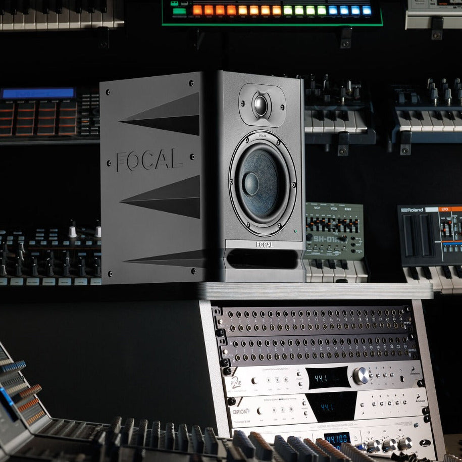 Focal Alpha 65 Evo active nearfield monitor speaker with black enclosure and control knobs on the front panel.