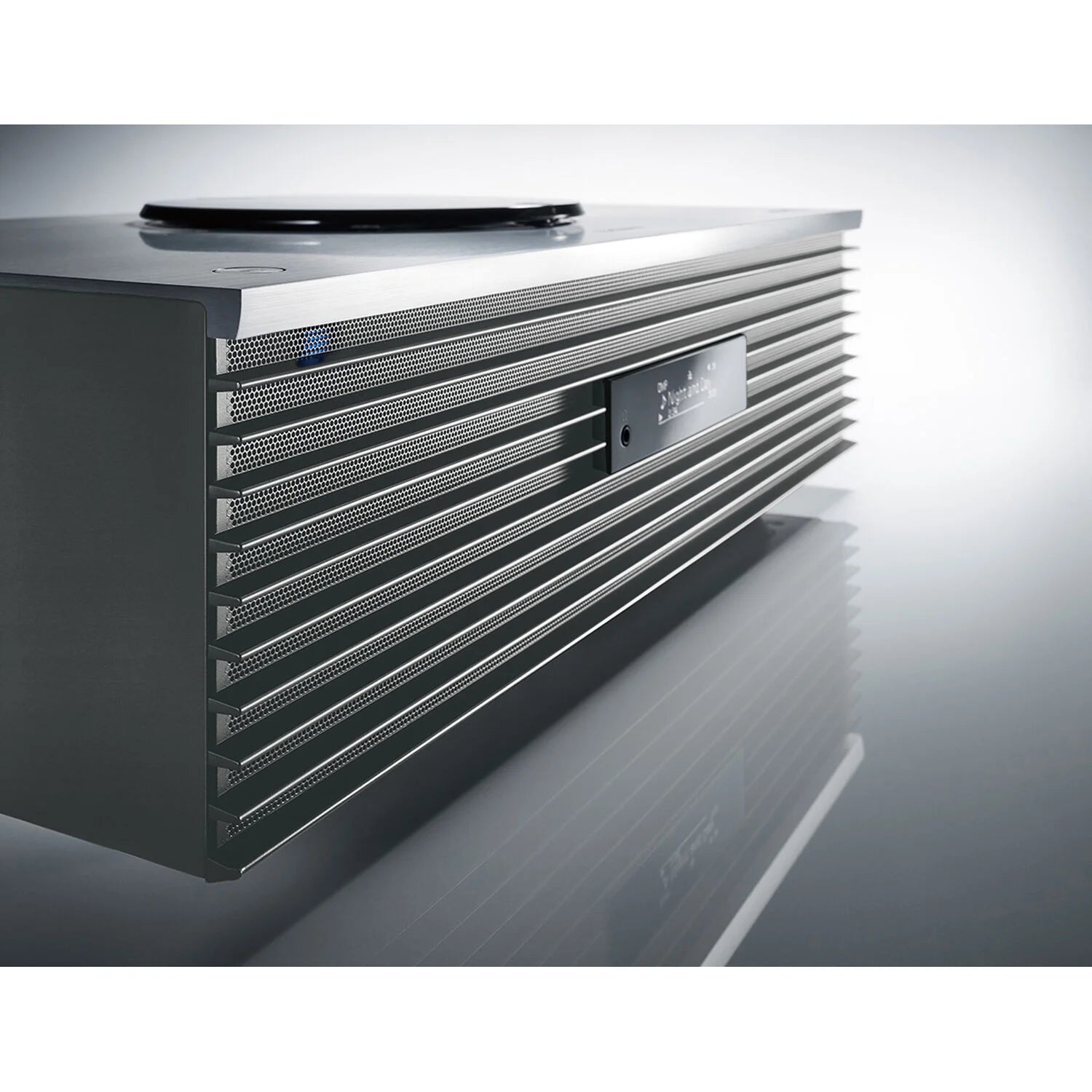 Technics SC-C70MK2 CD player with sleek black finish, digital display, and control buttons on top.