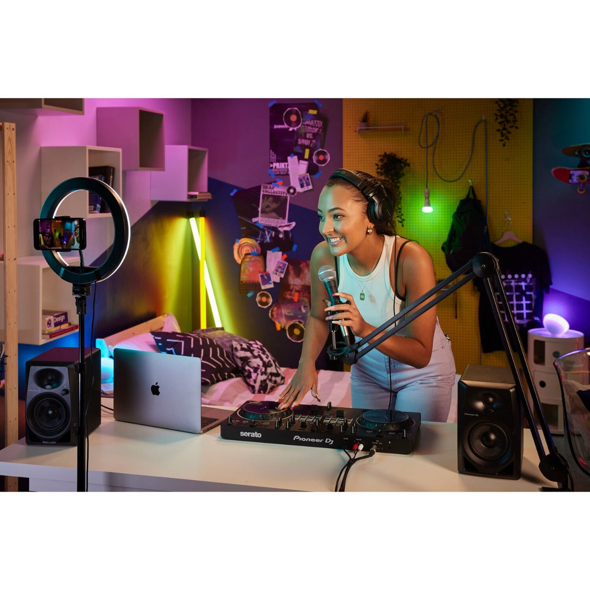 Black Pioneer DJ DDJ-REV1 DJ controller with jog wheels, buttons, and knobs for professional music mixing and DJing.