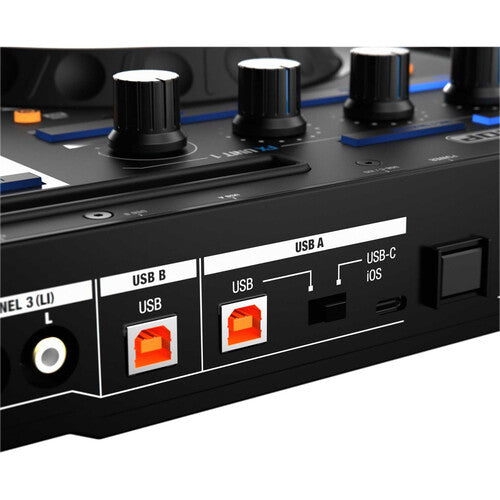 Reloop Mixon 8 Pro DJ controller with sleek design, multiple knobs, and vibrant LED lights for live performances.