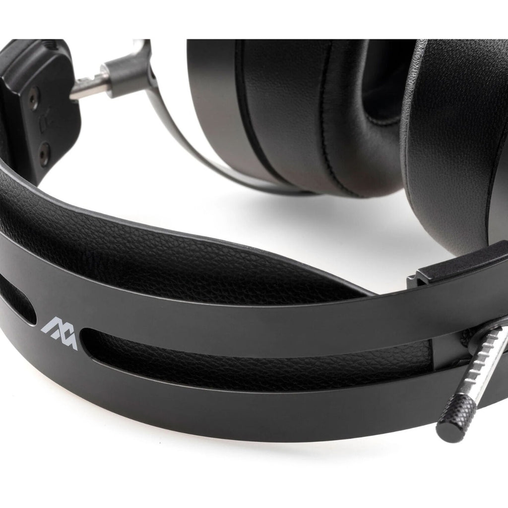 Audeze MM-500 studio headphones with over-ear design and sleek black finish, featuring large ear cups and adjustable headband.