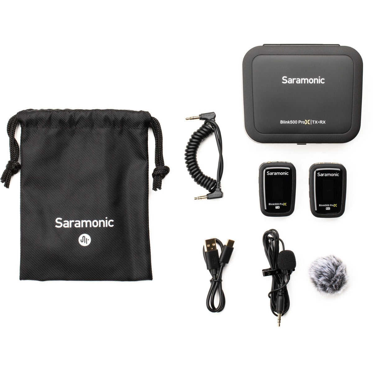 Saramonic Blink500 ProX B1 wireless microphone system for creators, featuring compact transmitter and receiver units on a table.