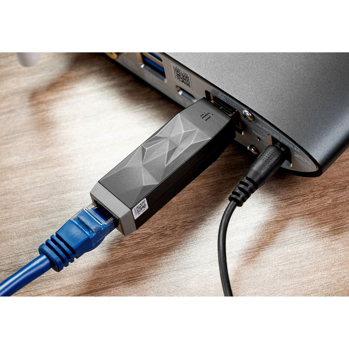 SilentPower LAN iSilencer noise filter and conditioner with sleek design and Ethernet port visible in the image.