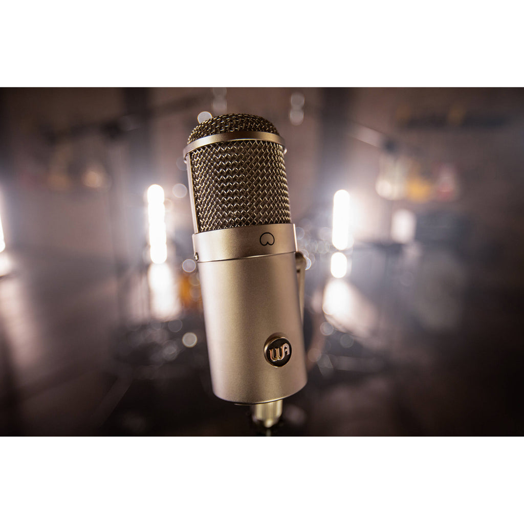 Warm Audio WA-47F condenser microphone with vintage-style metal body and gold finish, designed for studio recording.