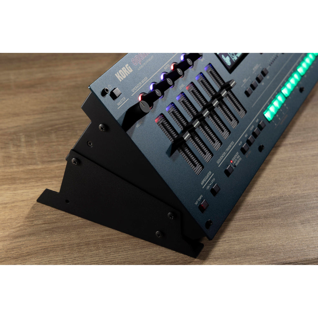 Korg Opsix synthesizer module with colorful control knobs and buttons, compact electronic music instrument for sound design.