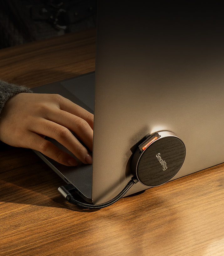 SmallRig SD4.0 Memory Card Reader connected to a computer, showing USB-C port and SD card slot for fast data transfer.