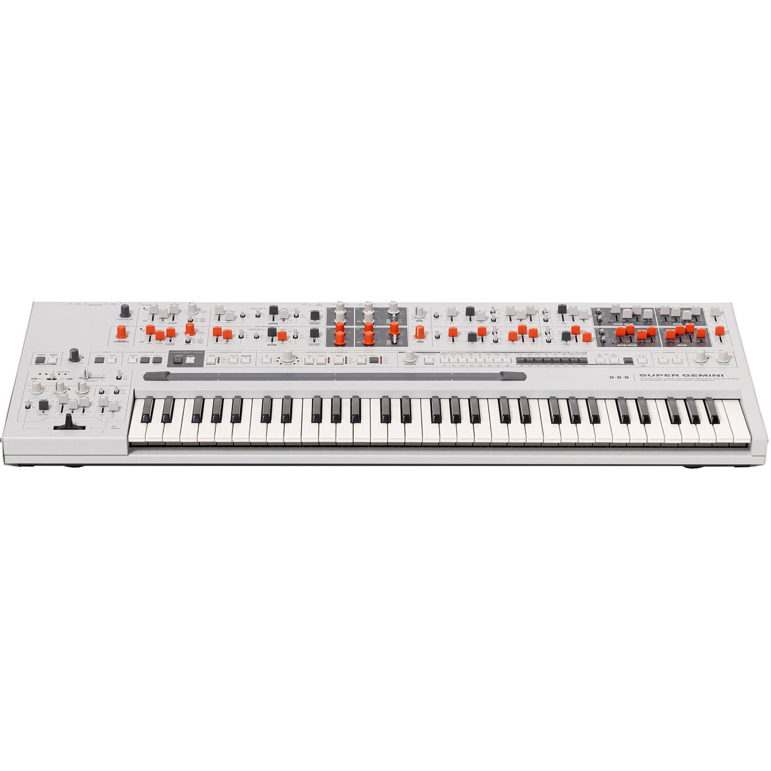 UDO Audio Super Gemini synthesizer with vintage-style knobs, colorful interface, and multiple control panels on a black background.