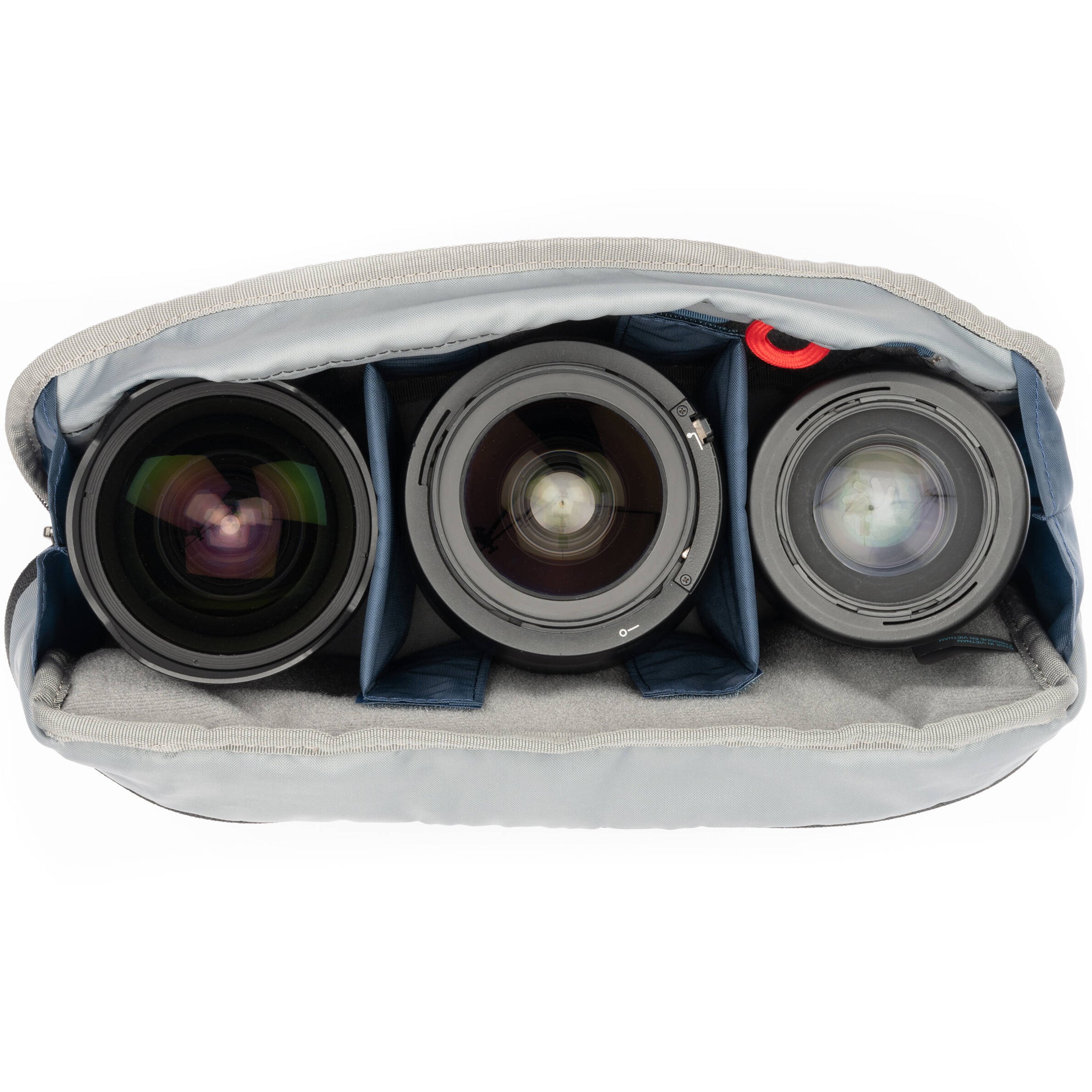 Think Tank PressPass video equipment bag with padded compartments and adjustable straps for professional camera gear storage.