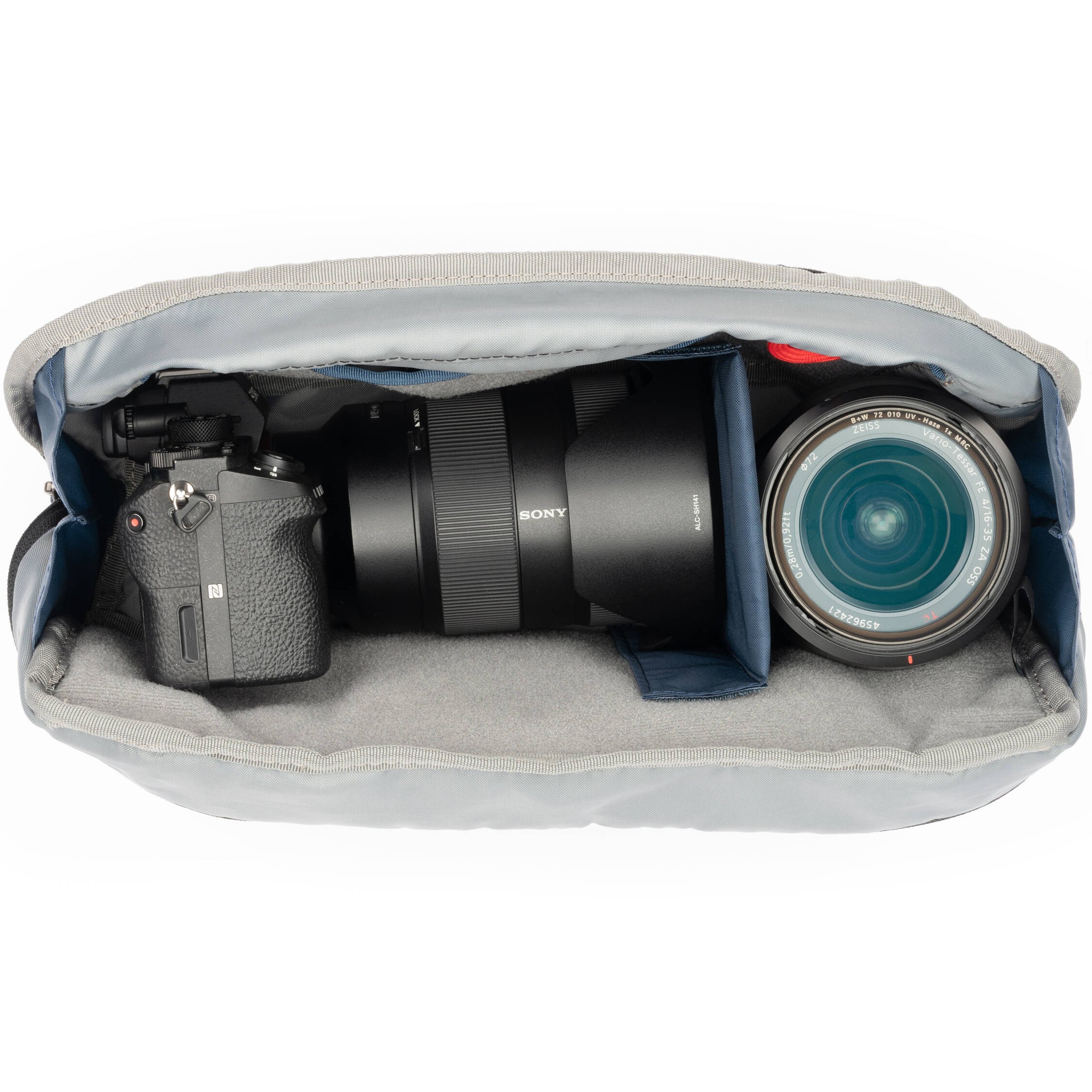 Think Tank PressPass video equipment bag with padded compartments and adjustable straps for professional camera gear storage.