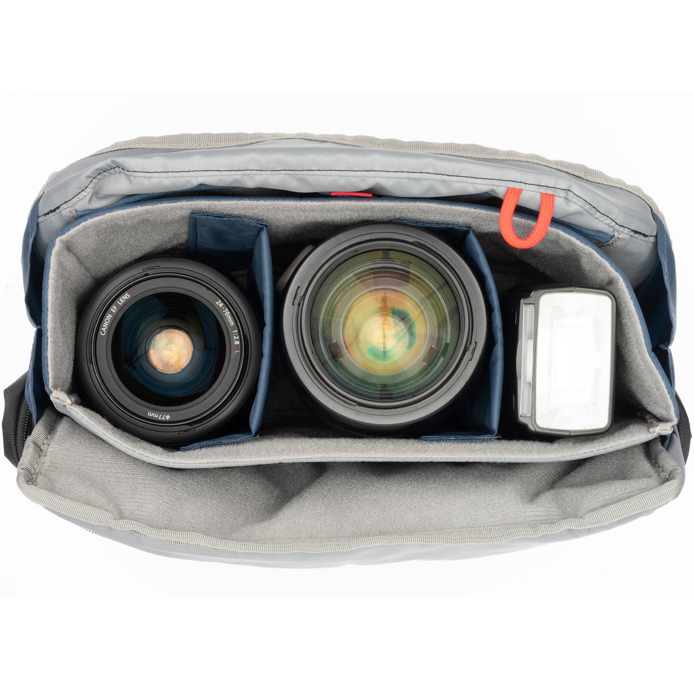 Think Tank PressPass video equipment bag with padded compartments and adjustable straps for professional camera gear storage.