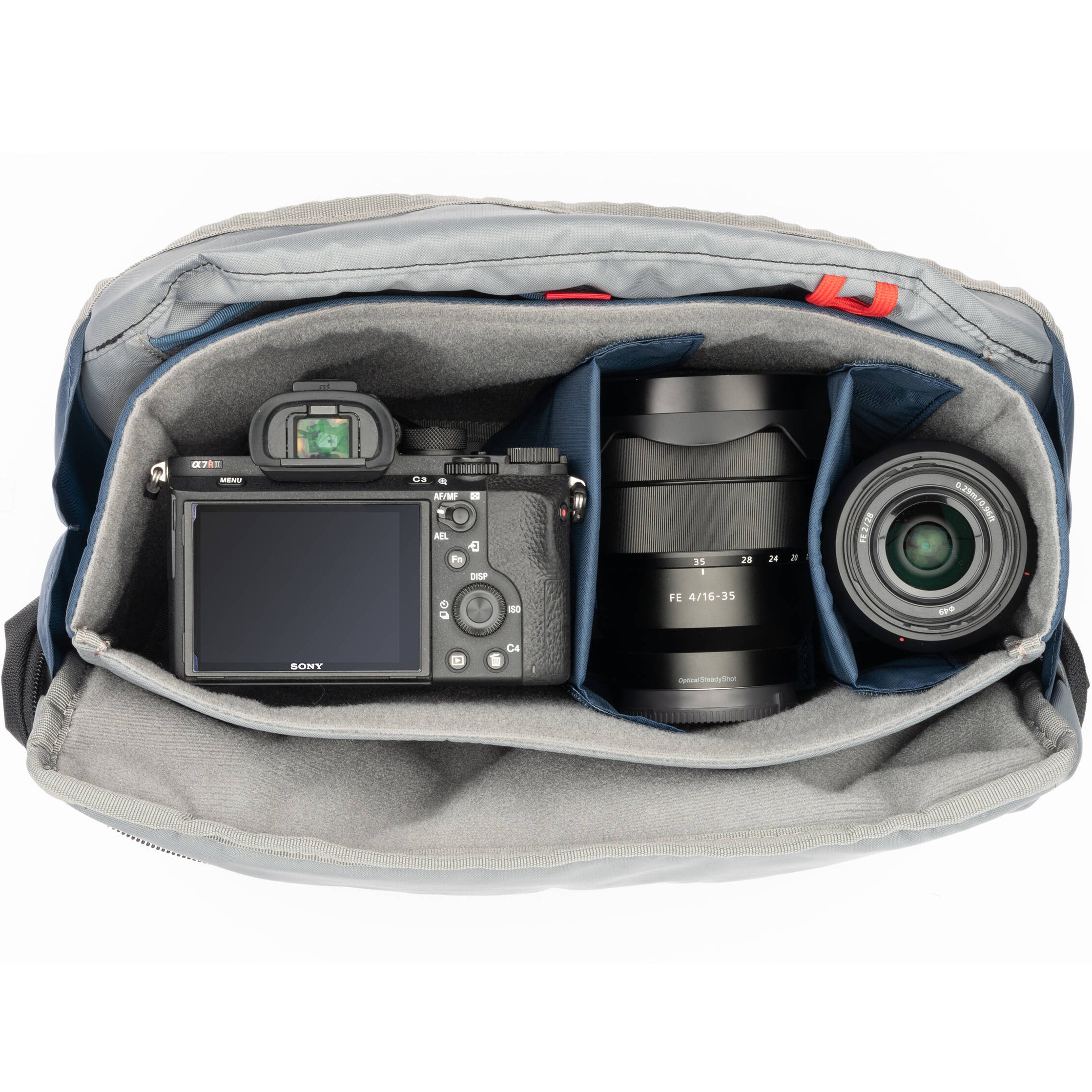 Think Tank PressPass video equipment bag with padded compartments and adjustable straps for professional camera gear storage.