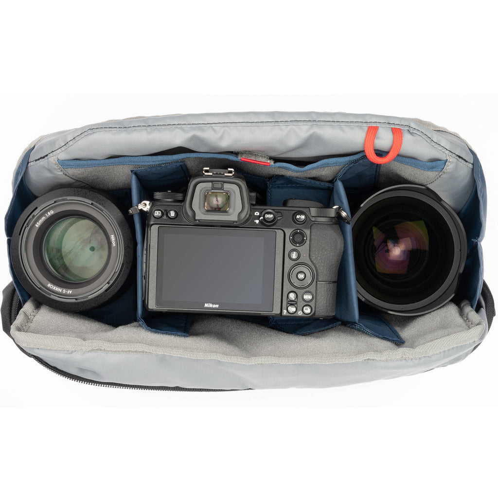 Think Tank PressPass video equipment bag with padded compartments and adjustable straps for professional camera gear storage.