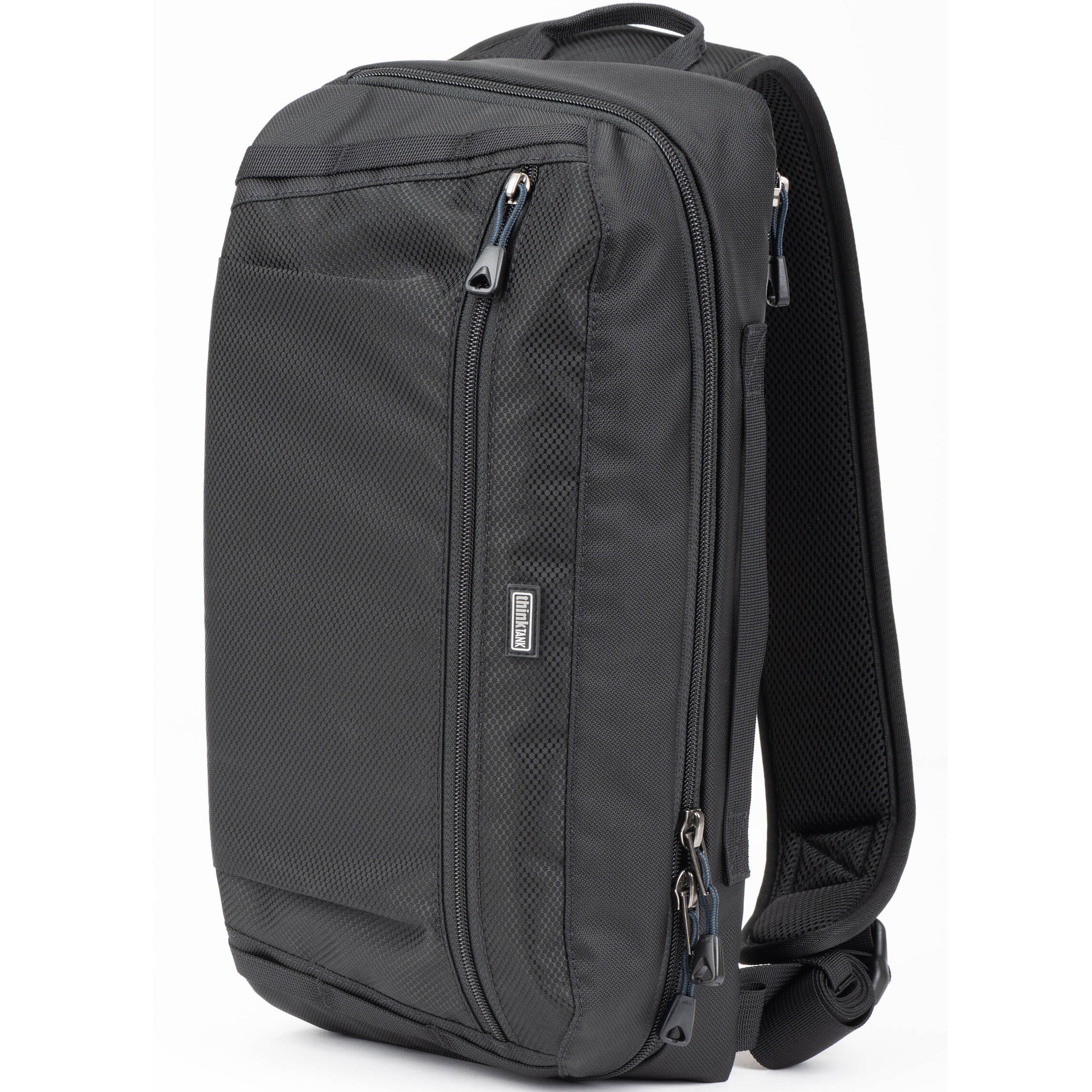 Think Tank PressPass Sling Bag for video equipment, black sling bag with adjustable strap and multiple compartments.