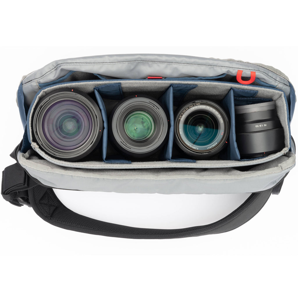 Think Tank PressPass Sling Bag for video equipment, showing durable black case with adjustable strap and multiple compartments.
