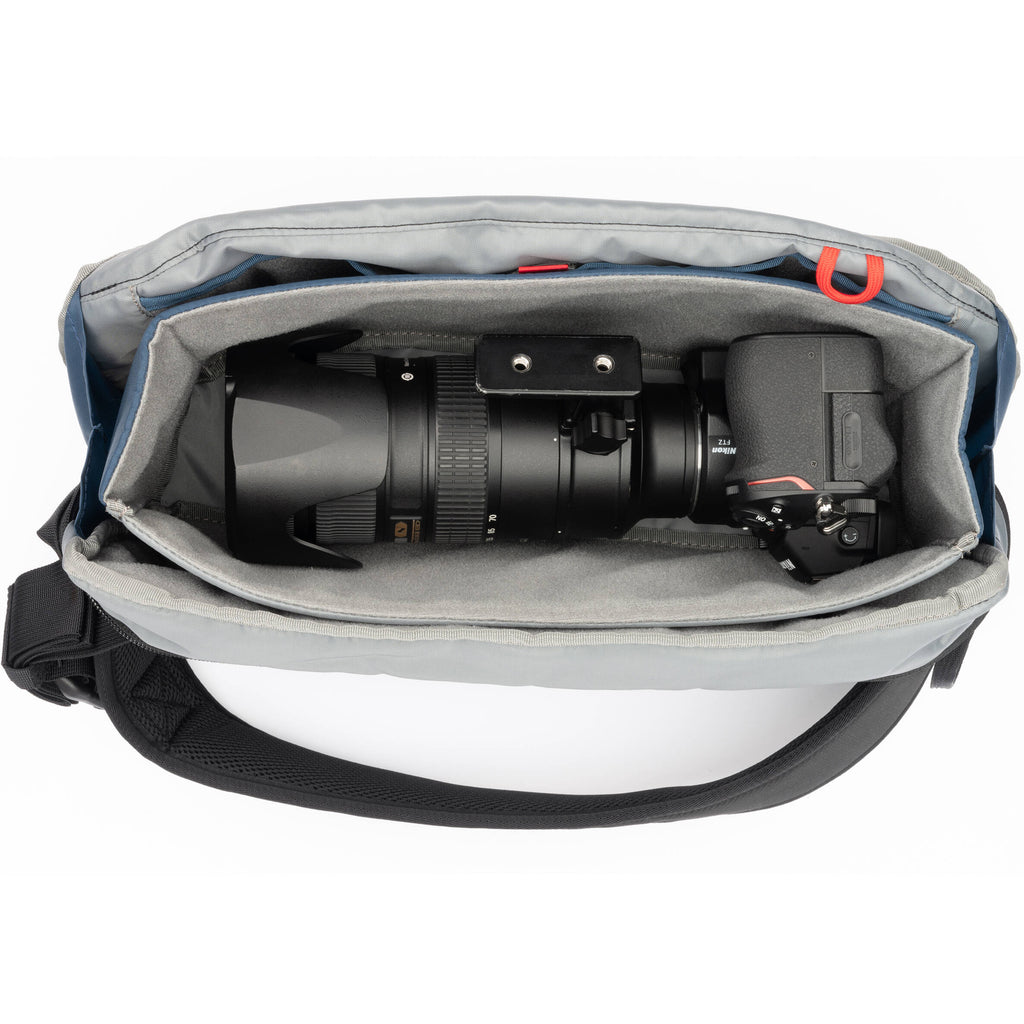 Think Tank PressPass Sling Bag for video equipment, black camera gear bag with adjustable strap and multiple compartments.