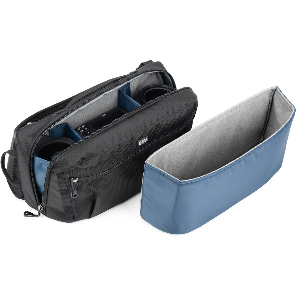 Think Tank PressPass Sling Bag for video equipment, black sling bag with multiple compartments and adjustable strap.