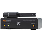 IK Multimedia ARC Studio room calibration device connected to audio equipment, demonstrating sound optimization setup.