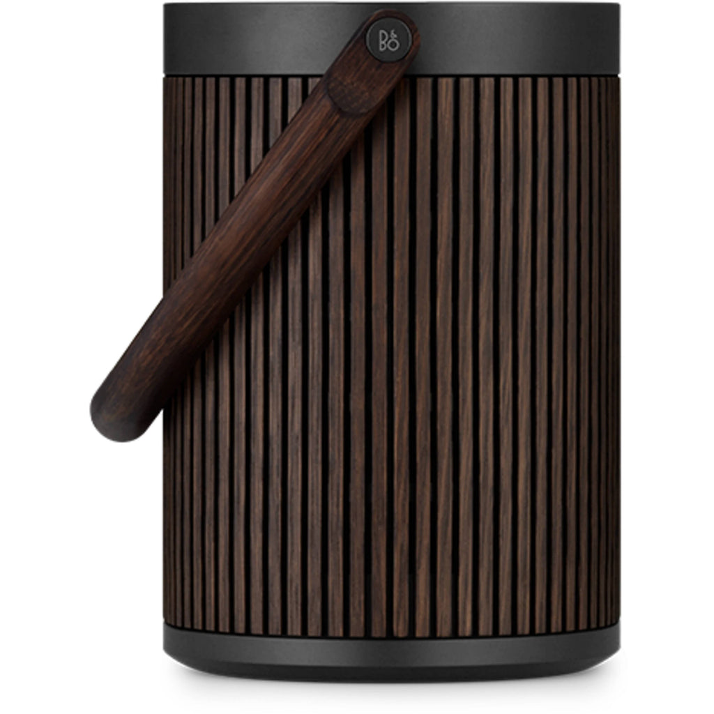 Bang & Olufsen Beosound A5 portable speaker with sleek design, fabric covering, and control buttons on top.