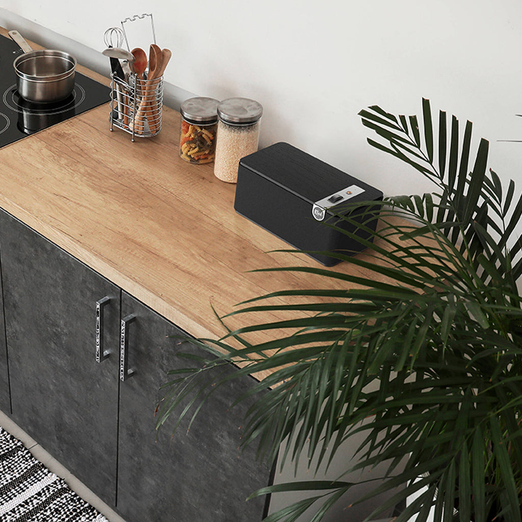 Klipsch The One Plus wireless speaker featuring a sleek black design, control knobs, and a compact, portable form factor.