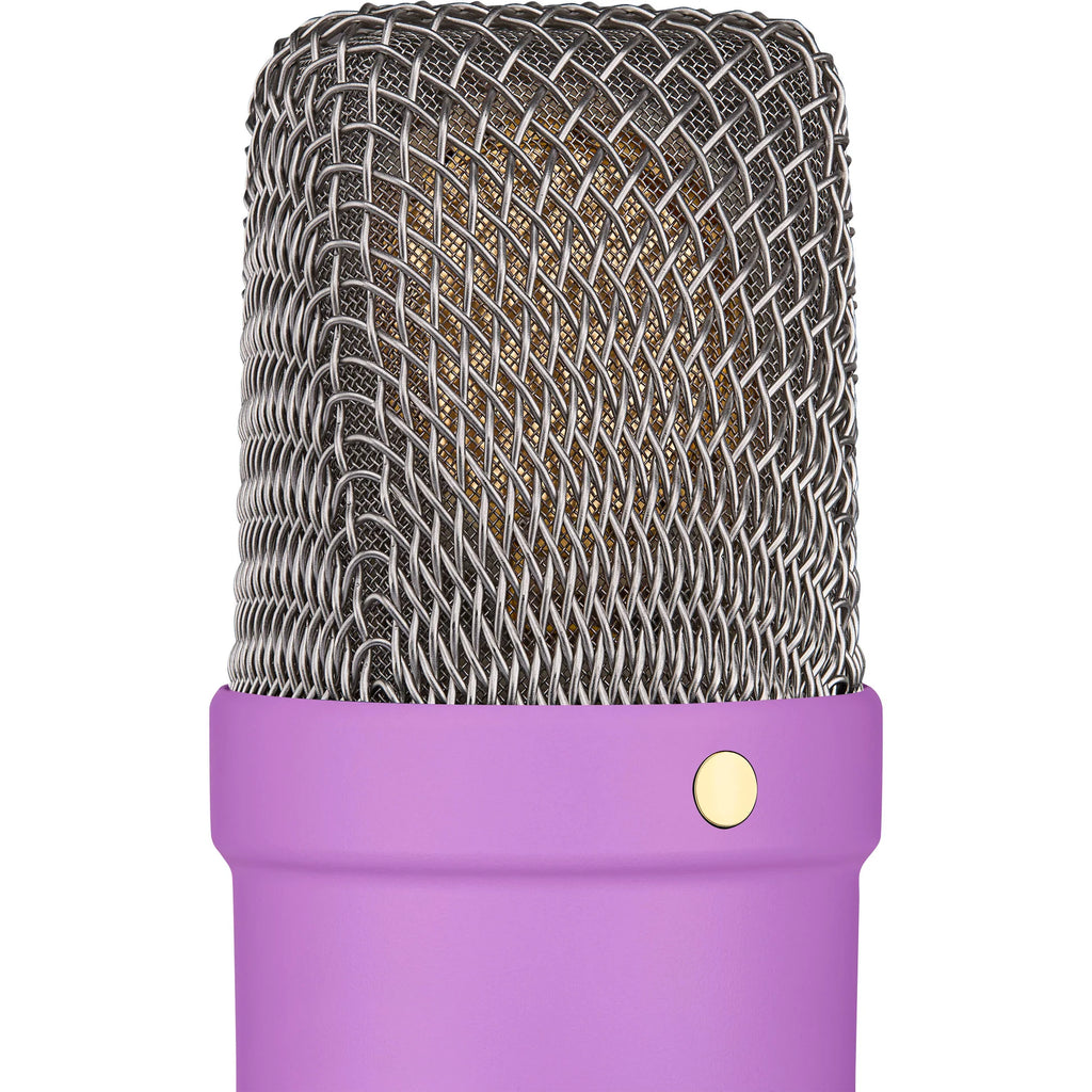 Rode NT1 Signature Series condenser microphone with black finish and gold accents, positioned on a stand for studio recording setup.