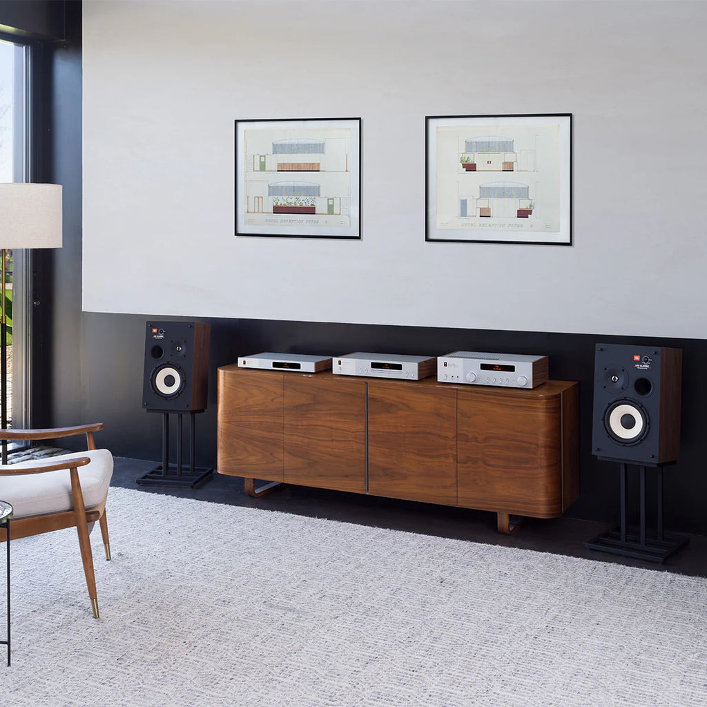 JBL MP350 Classic music streamer with black finish and control buttons on the front panel, connected to audio equipment.
