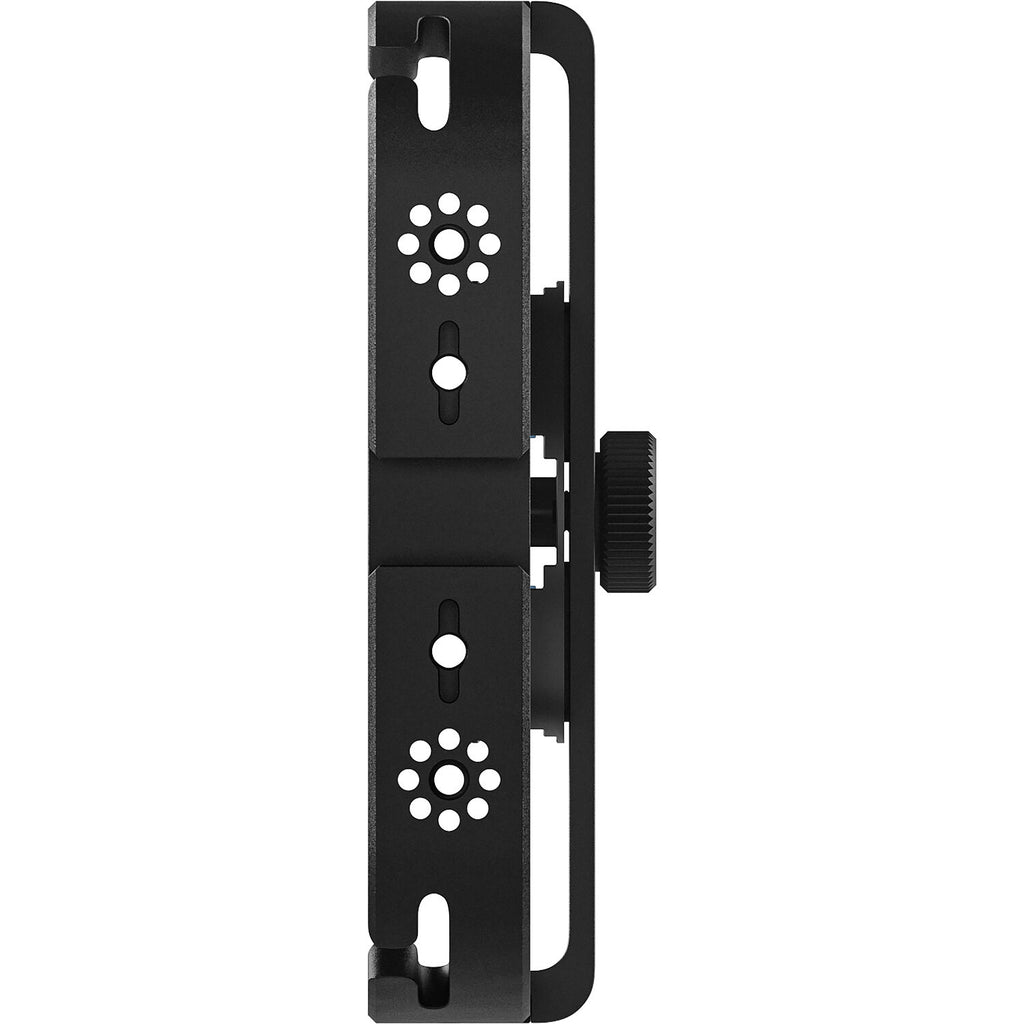 Rode Phone Cage mounted on a tripod, supporting a smartphone for stable video recording or photography setup.