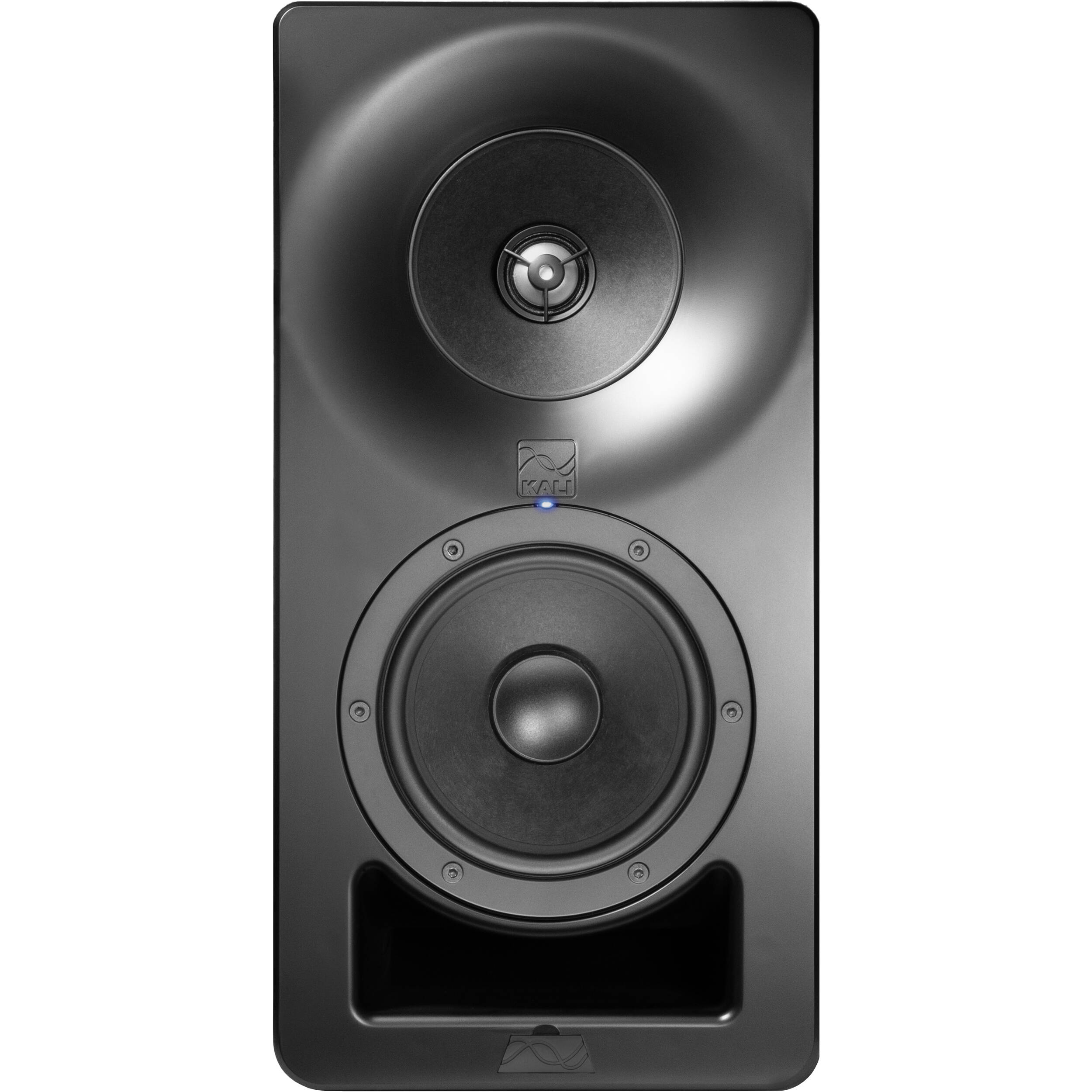 Kali Audio SM-5 active nearfield studio monitors shown on a desk with audio cables and a sound mixing setup.
