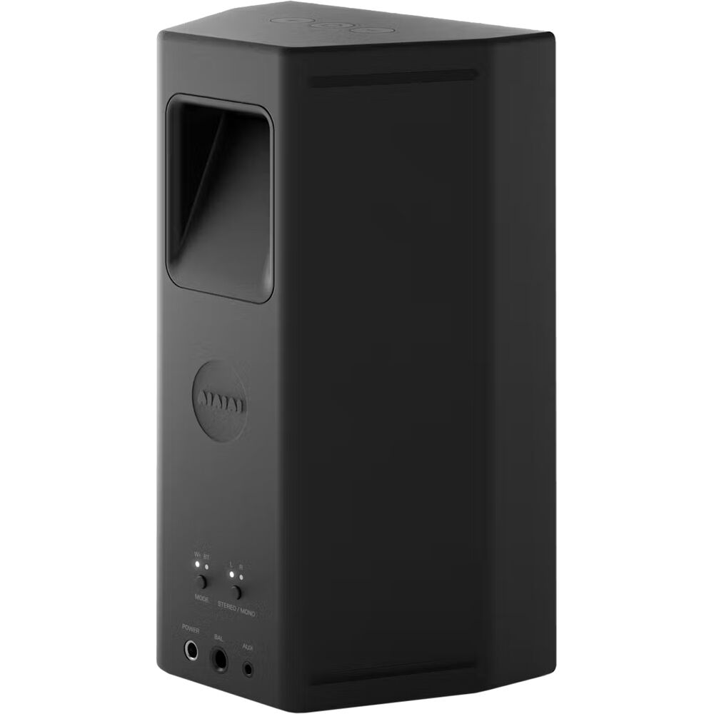 AIAIAI UNIT-4 Wireless+ active nearfield monitors shown on a studio desk with speakers and audio equipment.