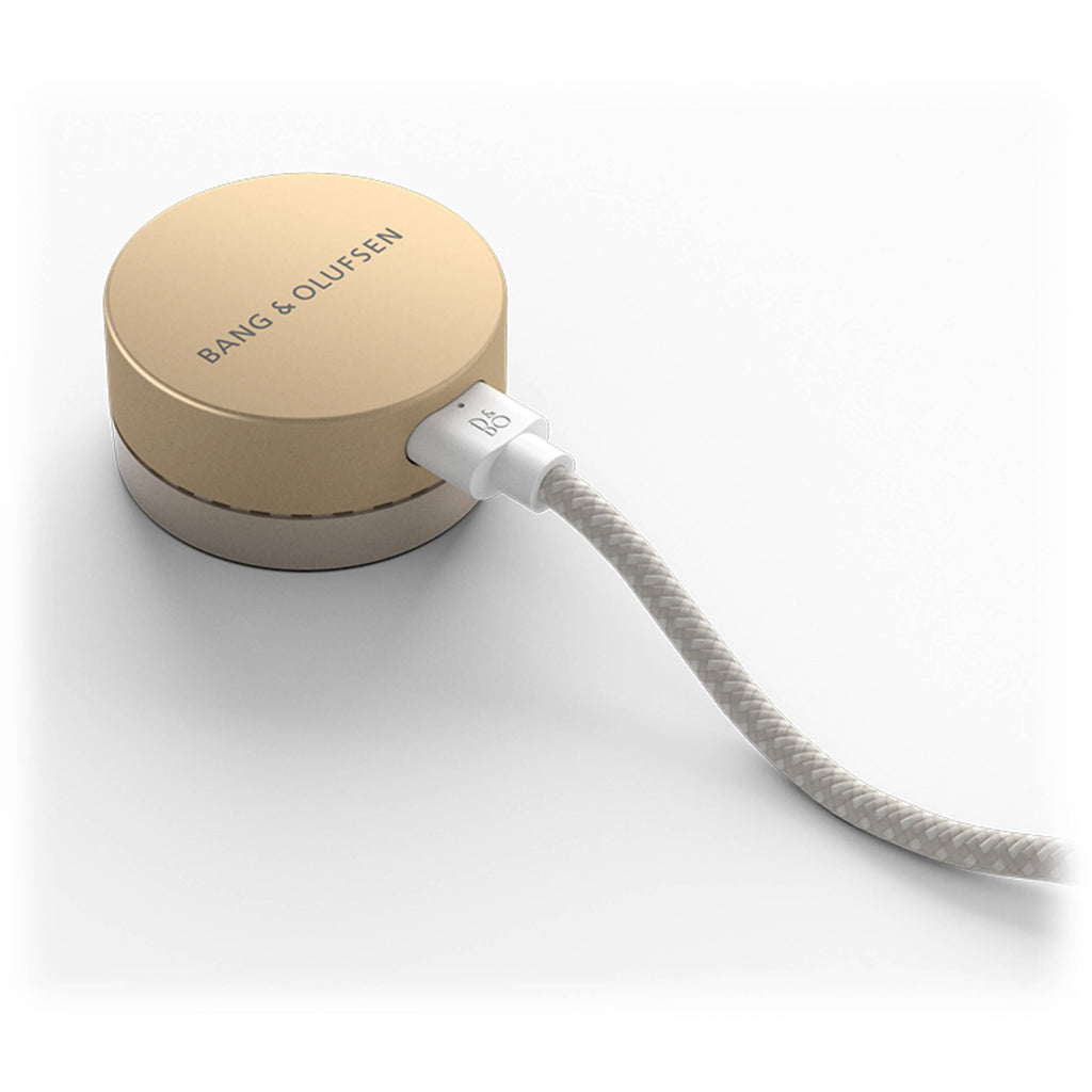 Bang & Olufsen Beosound Level wireless speaker with sleek design and fabric covering, showcasing modern home audio technology.