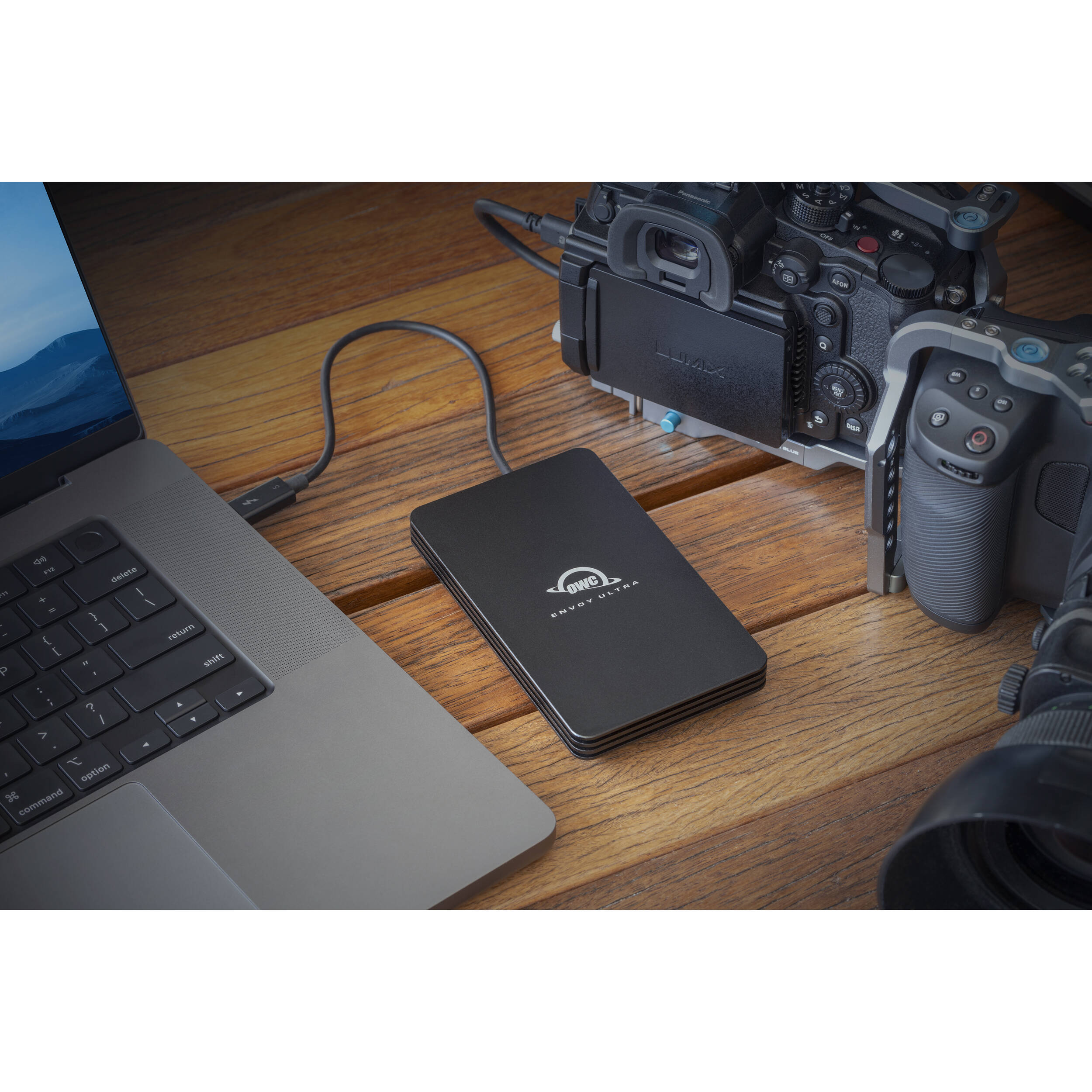 OWC Envoy Ultra SSD external drive with sleek black enclosure and USB-C connection for fast data transfer.