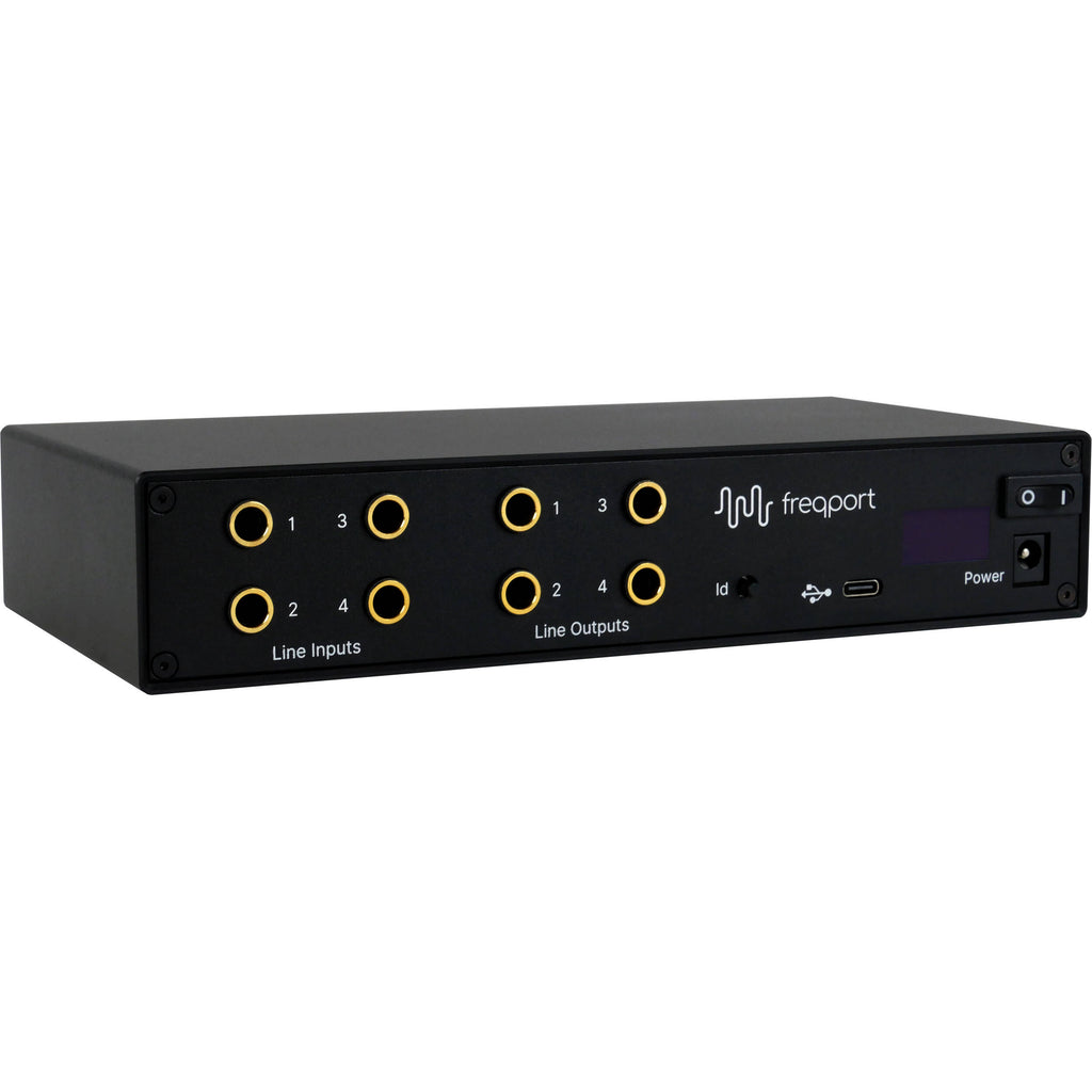 Freqport FreqInOut FO1 audio interface with multiple input and output ports, compact design, and professional-grade connectivity.