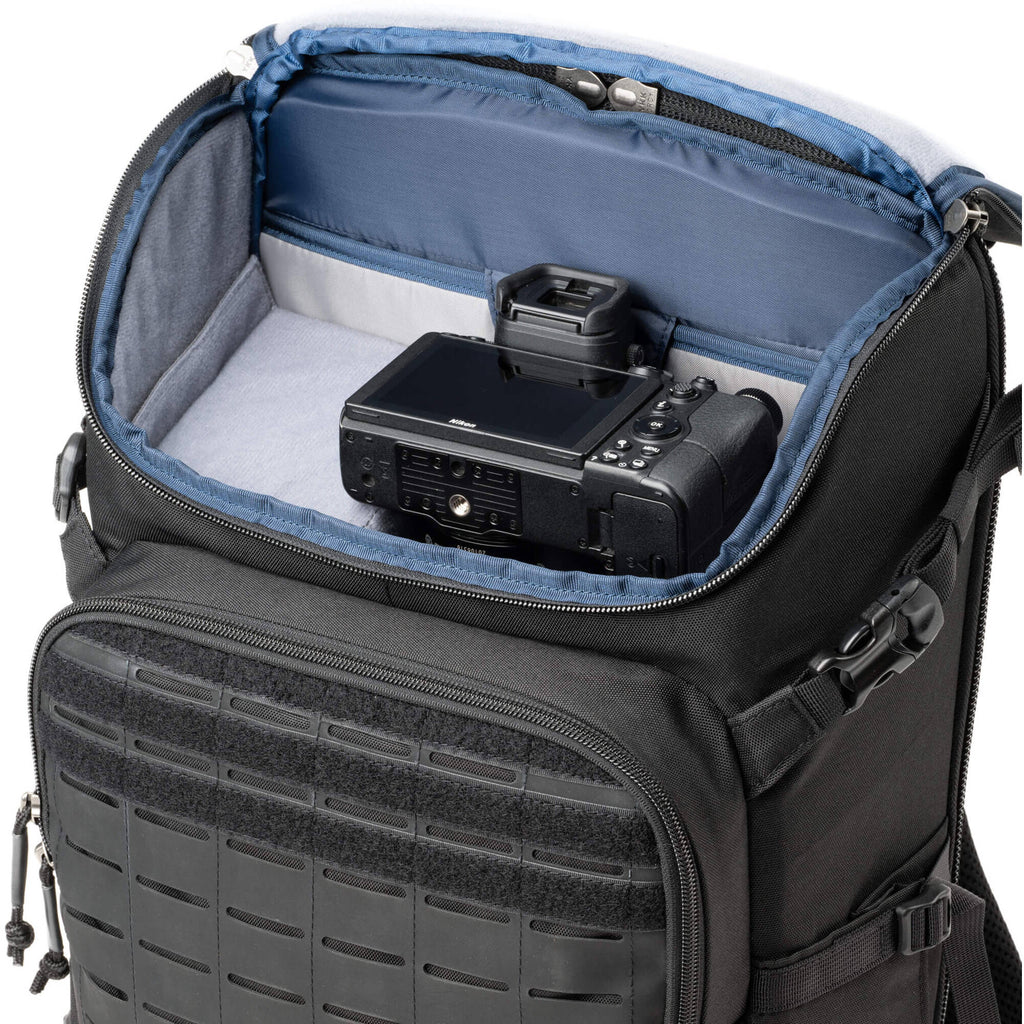 Think Tank DarkLight video equipment bag with padded compartments and adjustable straps for professional camera gear storage.